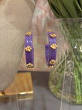 purple hoops with gold paw