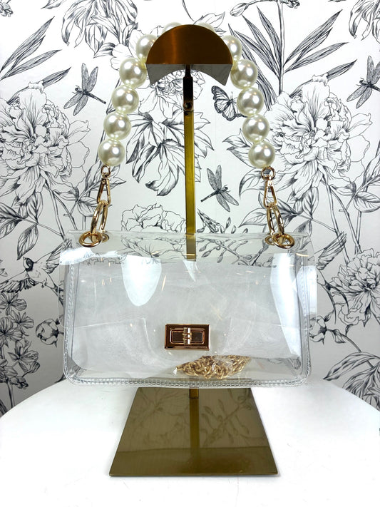 clear acrylic clutch/crossbody with big pearl handle