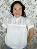 white babydoll blouse with lace and bow back FATE