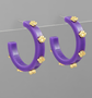 purple hoops with gold paws