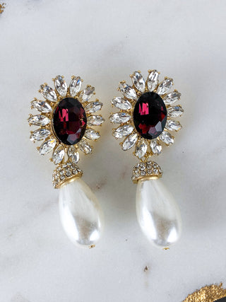 Bella Pearl Dangles, large ruby encircled by oval shaped CZ's and finished with a elongated pearl dangle. Post Back