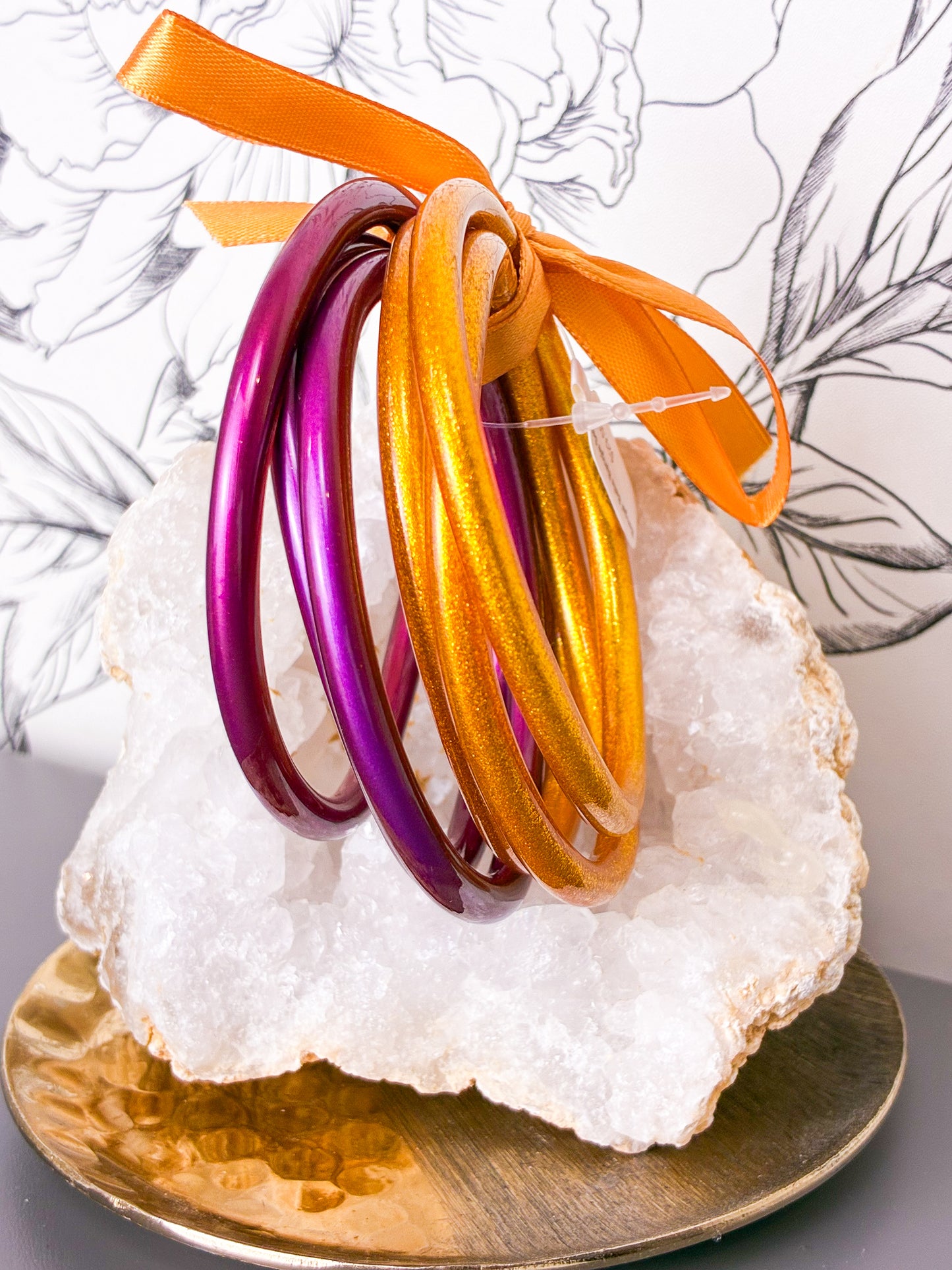 Six metallic bangles in purple, and gold are sold together as a set. LSU Game Day Bracelet Stack, Dupe without price