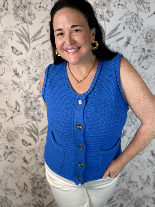 blue sweater vest braided entro