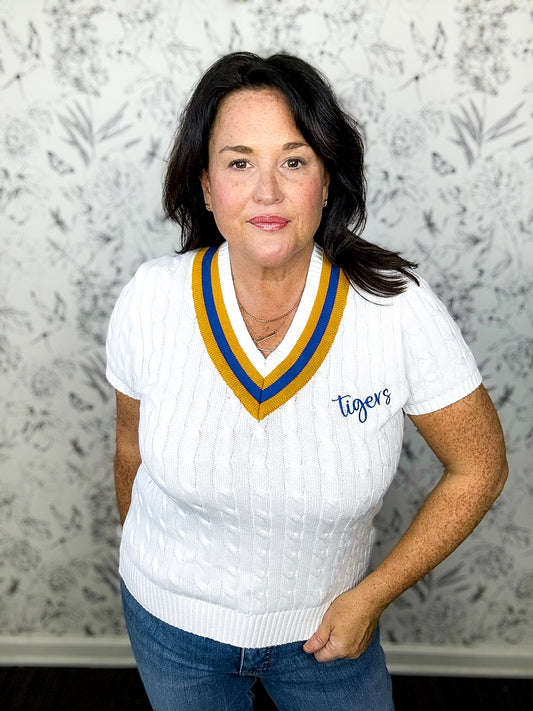 custom white cable knit LSU game day sweater with embroidered tigers.