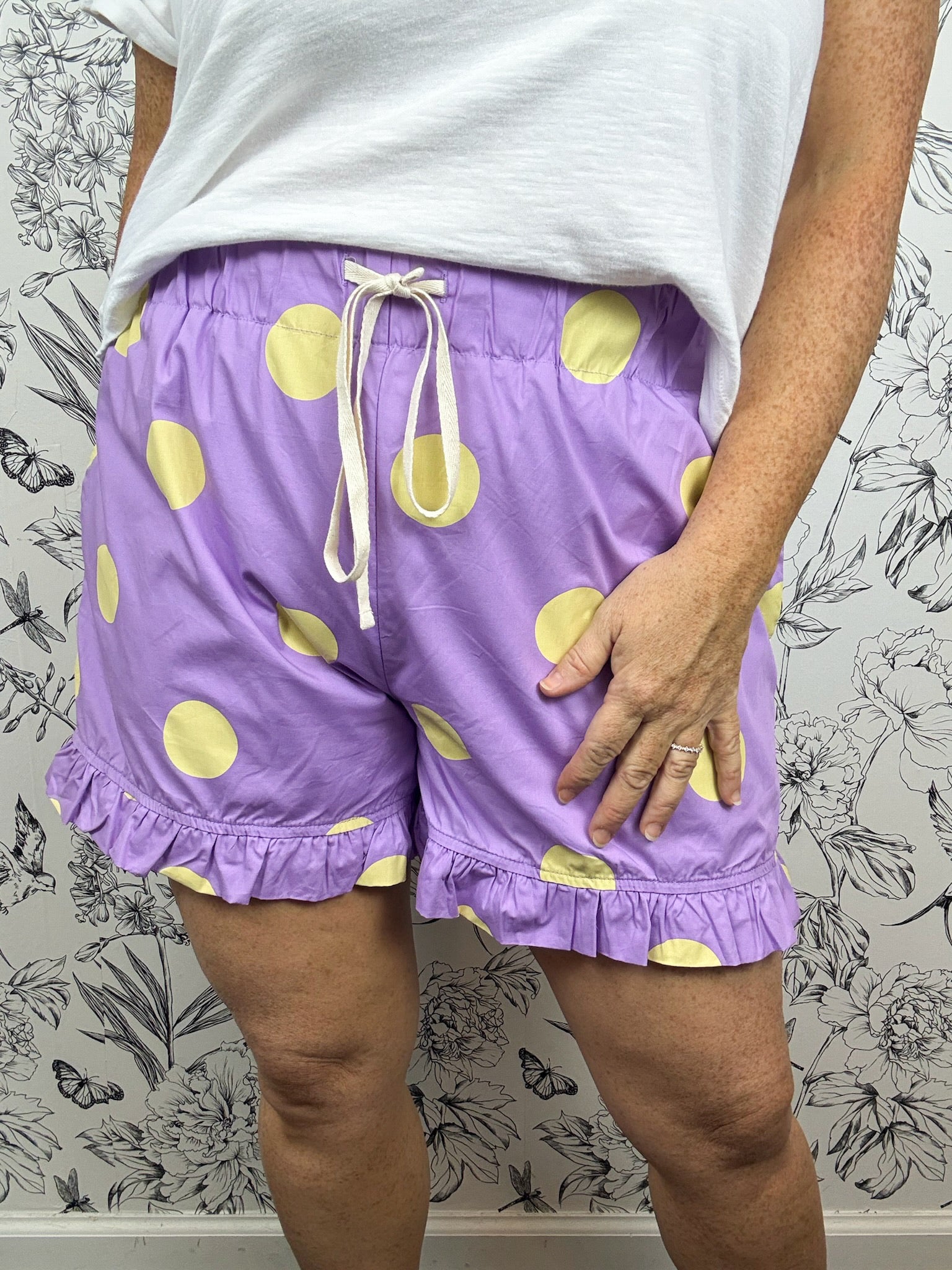 purple and yellow ruffle game day shorts