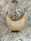 cream crescent shaped woven handbag