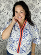 white blue and orange blouse VOY
