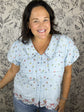 blue embroidered exposed stitch top & MERCI