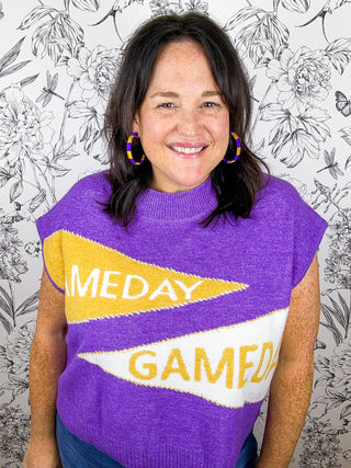 purple mockneck with yellow and white game day pennants Day & Moon