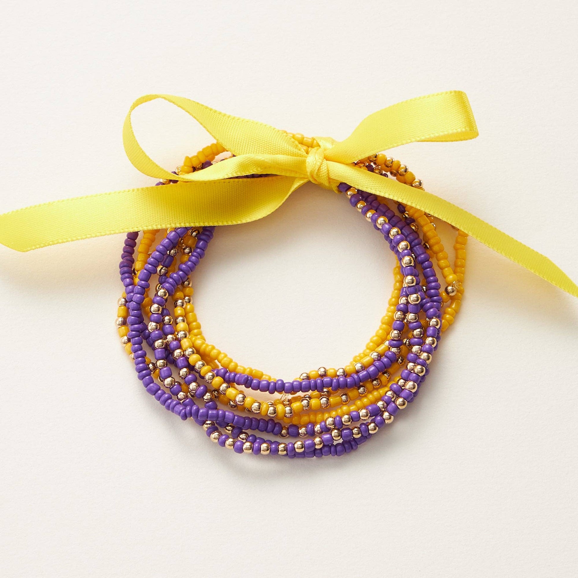 purple and gold game day jewelry